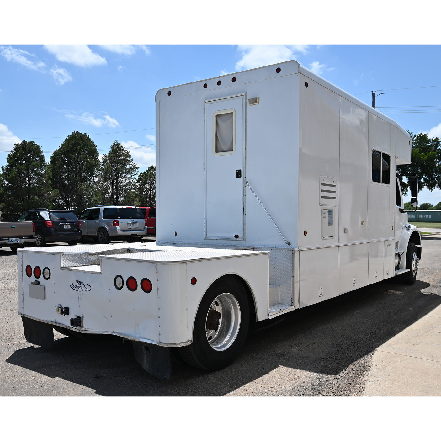 2005 Freightliner M2 Step Deck with 13' LQ and 7'6" Bed