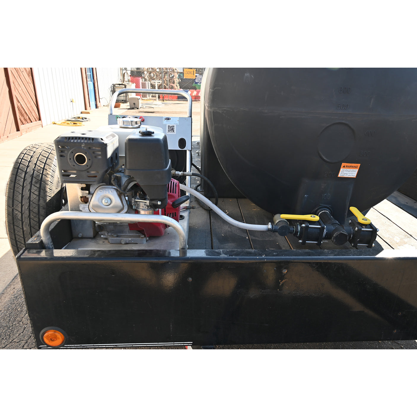 2024 1000 Gallon Pressure Washer on a 14' Load Trail Trailer Lightly Used